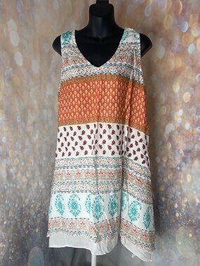 Unique Sleeveless Pullover Tunic Dress with Handkerchief Hem Size: L/XL